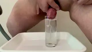 Chubby Latino Fills Glass With Cum and Piss