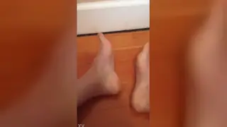 Asian Man Showcases Size Twelve Feet in Close Detail