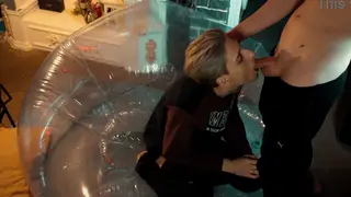 Three Inked Twinks Share Blowjobs on Inflatable Chair