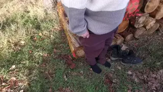 European Woman Receives Outdoor Spanking Near Tree Cutting