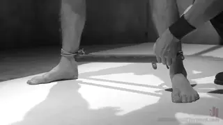 Tattooed Hunk Endures Bondage and Toy Torment