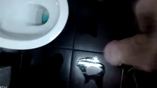 Hairy European Strokes His Uncut Cock in a Bathroom