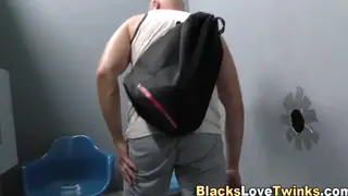 Muscular Ebony Stranger Unloads a Facial Through Gloryhole