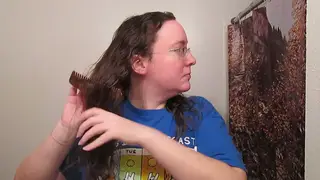 Chubby Brunette Combs Her Long Strawberry Blonde Curls
