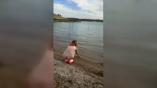 Redhead Teen Walks Naked on Public Beach