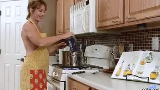 Voluptuous MILF Pleasures Herself with a Giant Dildo in the Kitchen