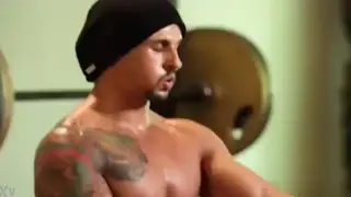 Muscular Coach Shows Off Bulge During Gym Session