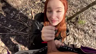 Petite Redhead Deepthroats a Big Cock in the Woods
