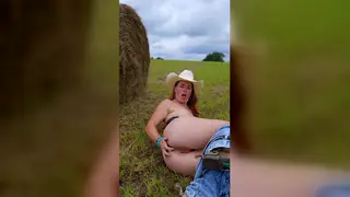 Redhead Teases Outdoors With Pussy Licking Show