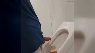 Asian Guy Strokes Uncut Cock Outdoors Then Pisses