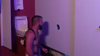 Hairy Daddy Feeds His Cock Through a Gloryhole