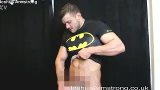 Muscular Stud Flexes in Shiny Gear for Solo Show
