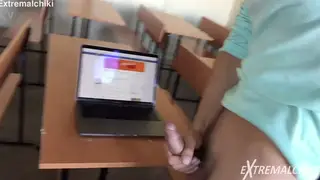 Student Strokes Hard Cock in Classroom
