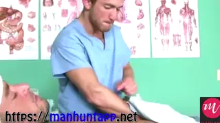 Hospital Doctor Examines a Patient on the Exam Table