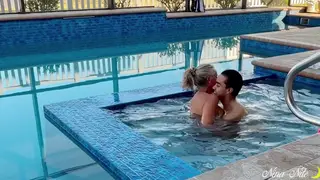 Voluptuous MILF Delivers Poolside Blowjob Under the Sun