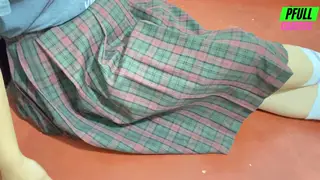 Latina in Skirt and Lingerie Teases with Playful Strip