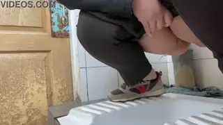 Curvy MILF Pisses in Hospital Toilet Stall