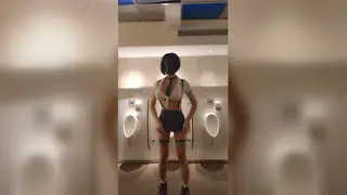 Asian Femboy in Schoolgirl Uniform Strokes in Public Restroom