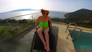 Busty Redhead Strokes and Sucks by the Pool