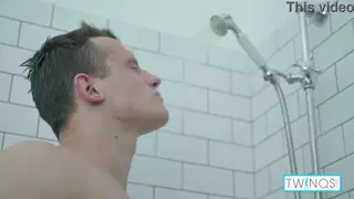 Brunette Jock Strokes His Thick Cock in a Steamy Shower