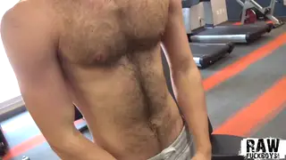 Hairy Hunk Flexes Big Cock After Gym Session