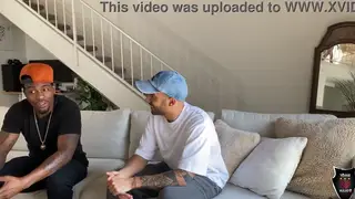 Tattooed Brunette Handles Two Cocks in Interracial Orgy
