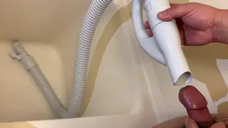 Chubby Latino Bear Pisses and Cums Into a Vacuum Hose