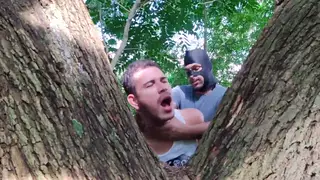 Hairy Guy Gets Blown in the Bush by Masked Partner