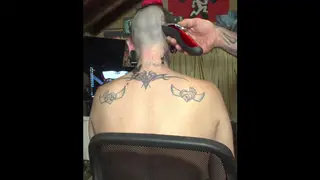Busty MILF Shows Off Shaved Head and Big Tits