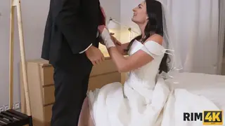 Brunette Bride Rims Groom Poolside Before Ceremony