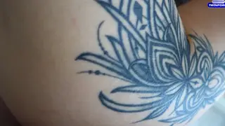 Petite Tattooed Girl Takes Cumshot in Kitchen POV