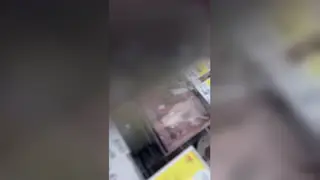 Mature Woman Flashes in a Supermarket Aisle