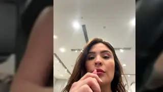 Busty Woman Masturbates in a Mall Dressing Room