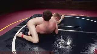 Muscular Wrestlers Trade Deepthroat in Oil-Slick Match