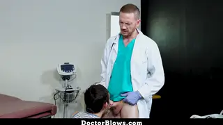 Muscular Doctor Uses a Teen Patient on an Exam Table