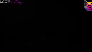 Busty Woman Handles Two Cocks at Gloryhole Club