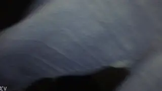 Crossdresser Teases in Lace Thong at a Dark Cinema