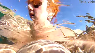 Curvy Redhead BBW Flaunts Hairy Bush on Nude Beach