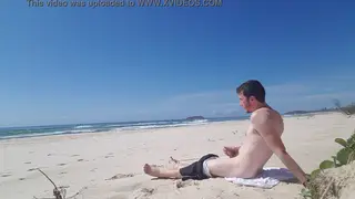 Solo Guy Strokes His Cock on a Public Beach