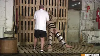 Older Dom Restrains Young Sub With Toys