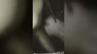 Latino Employee Services His Boss at a Desk