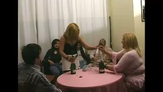 Busty Women Share Older Men in a Vintage Orgy