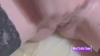 European Teen in Stockings Soaks Herself With Piss and Squirt