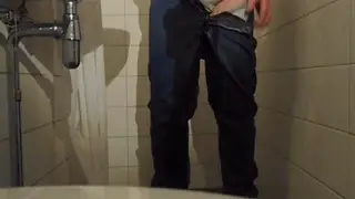 Muscular Jock Soaks Jeans in Double Wetting