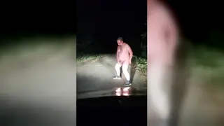 Heavy Bear Finishes on Himself Outdoors at Night