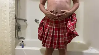 Curvy Mature Woman Explores Anal Inflation in a Hotel Bathroom