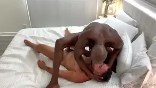 Interracial Muscle Couple Fucks Bareback at Home