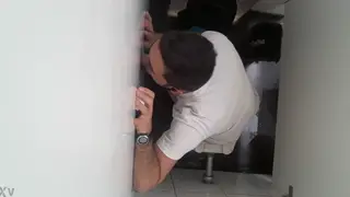 Anonymous Blowjob Through a Gloryhole Partition