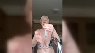 Blonde MILF Pleasures Herself with a Frozen Condom Toy
