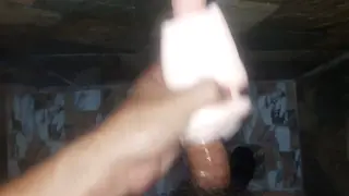 European Stud Handles Toy During Slow Handjob Session